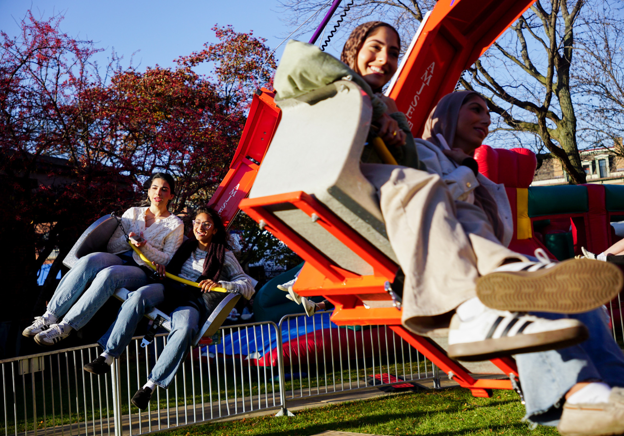 Students ride a carnival ride